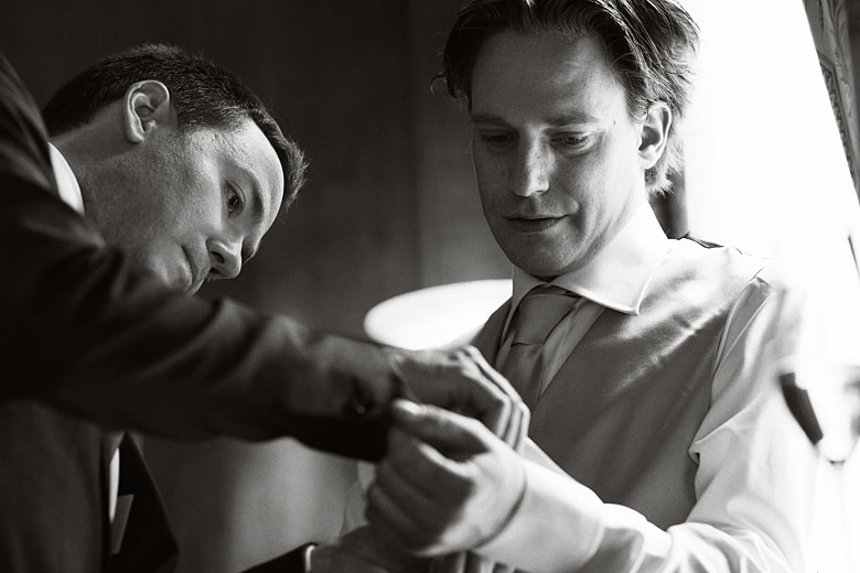 best man and the groom getting ready
