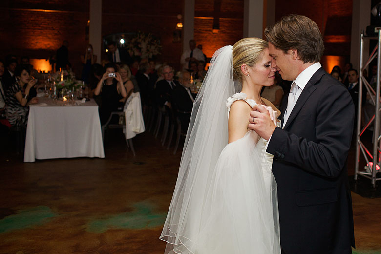 bride and groom dancing the first slow dance as husband and wife
