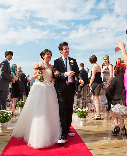 walking on he red carpet on the wedding day