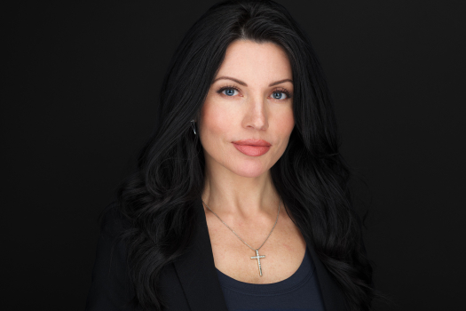 Professional business headshot of a confident woman photographed in studio by Montreal photographer Vadim Daniel