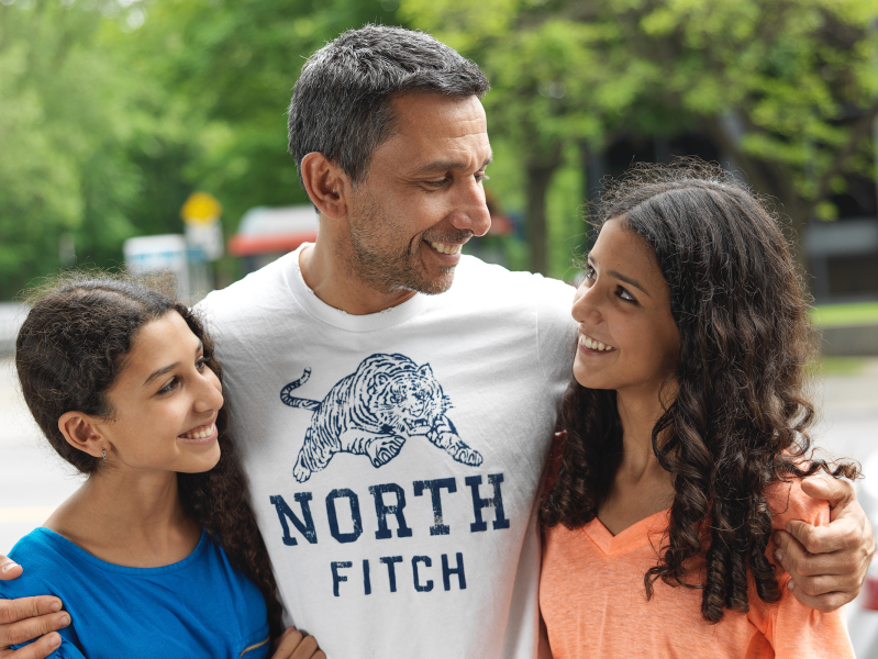 father with his girls portrait